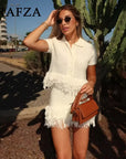 TRAFZA 2025 Spring Summer Sexy Knitted Tassel Solid Women Suit Fashion Turndown Collar Hollow Out Shirt Elastic Wasit Mini Skirt