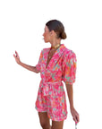 Amerikaanse zomer nieuwe mode 2025, dames bedrukt casual trendy v-hals bladerdeeg mouw elastische taille jumpsuits shorts vrouwelijke kleding